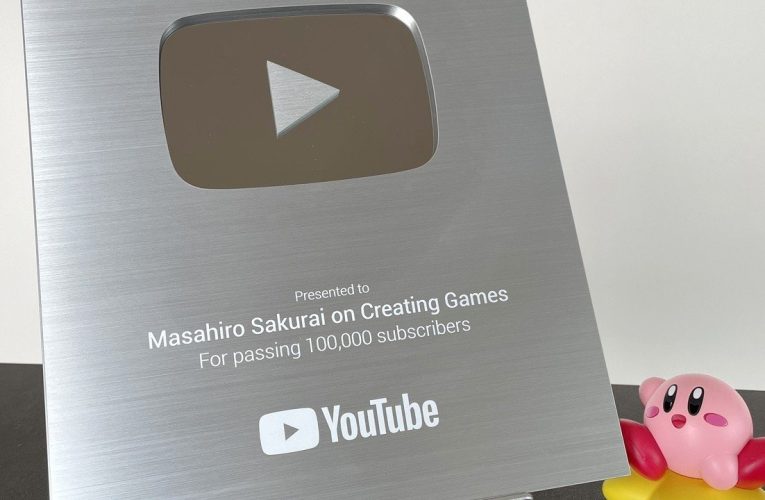 Aléatoire: Masahiro Sakurai montre son bouton de lecture argenté sur YouTube